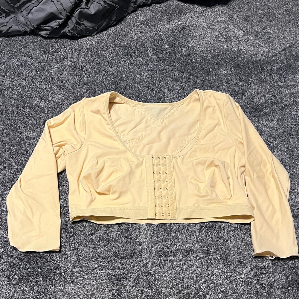 Compression sleeves with built in bra